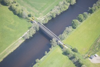 Oblique aerial view of Ballindalloch railway bridge, looking ENE.