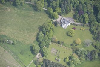 Oblique aerial view of Kininvie House, looking ENE.