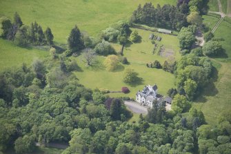 Oblique aerial view of Kininvie House, looking SW.