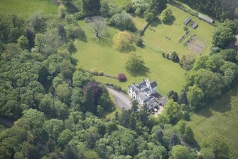 Oblique aerial view of Kininvie House, looking SSW.