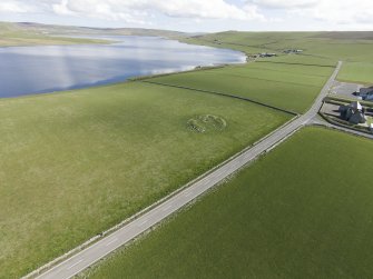 Oblique aerial view of Oxtro broch, looking SE.