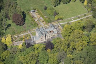 Oblique aerial view of Auchenibert Country House, looking WNW.