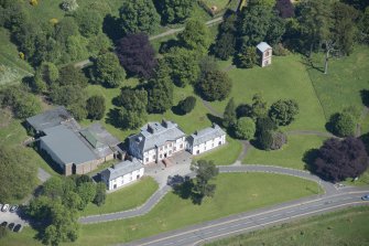 Oblique aerial view of the Strathleven House and dovecot, looking NNE.