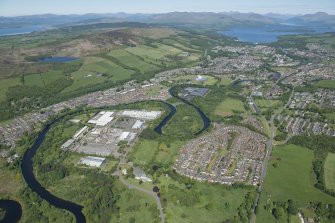 General oblique aerial view of Alexandria and Renton with Strathleven House in the foreground and Loch Lomond in the distance, looking N.