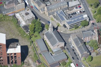 Oblique aerial view of Riverside Parish Church, looking WNW.