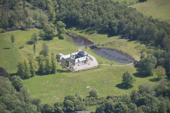 Oblique aerial view of Dougalston Factor's House, looking ESE.