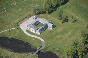 Oblique aerial view of Dougalston Factor's House, looking NW.