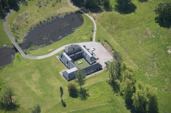 Oblique aerial view of Dougalston Factor's House, looking SSE.