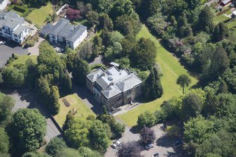 Oblique aerial view of Kilmardinny House, looking E.