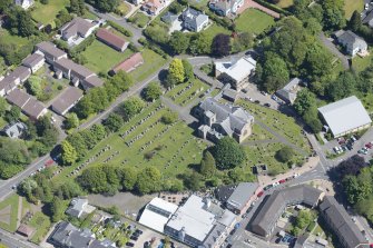 Oblique aerial view of New Kilpatrick Parish Church, looking NE.