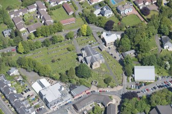 Oblique aerial view of New Kilpatrick Parish Church, looking NNE.