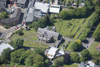 Oblique aerial view of New Kilpatrick Parish Church, looking WSW.