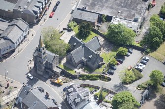 Oblique aerial view of Kirkintilloch Old Church and Town Steeple, looking ESE.