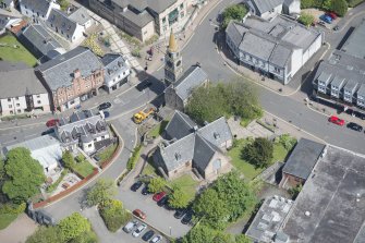 Oblique aerial view of Kirkintilloch Old Church and Town Steeple, looking NE.