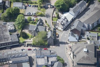 Oblique aerial view of Kirkintilloch Old Church and Town Steeple, looking S.