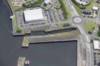 Oblique aerial view of Cartsburn Shipyard Dry Dock, looking ESE.