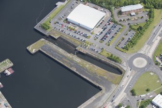 Oblique aerial view of Cartsburn Shipyard Dry Dock, looking E.