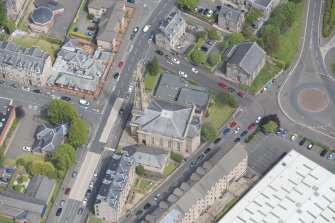 Oblique aerial view of The Old Kirk and Ardgowan Hospice, looking NE.