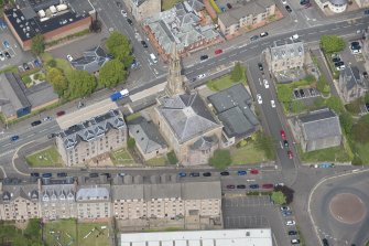 Oblique aerial view of The Old Kirk and Ardgowan Hospice, looking NNW.