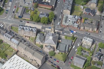 Oblique aerial view of The Old Kirk and Ardgowan Hospice, looking NW.