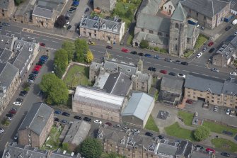 Oblique aerial view of St John The Evangelist Episcopal Church and Greenock Art Gallery and Library, looking NE.