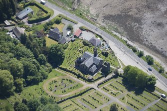 Oblique aerial view of Kilmun Cemetery, St Munn's Church and Collegiate Church of St Mun, looking SE.