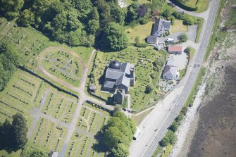 Oblique aerial view of Kilmun Cemetery, St Munn's Church, Collegiate Church of St Mun and St Munn's Church and Churchyard, looking ESE.