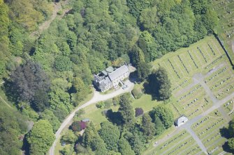 Oblique aerial view of Old Kilmun House and Kilmun Cemetery, looking NE.