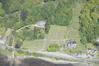Oblique aerial view of Kilmun Cemetery, St Munn's Church, Collegiate Church of St Mun, Old Kilmun House and St Munn's Church and Churchyard, looking N.