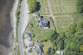 Oblique aerial view of Kilmun Cemetery, St Munn's Church, and Collegiate Church of St Mun, looking WNW.
