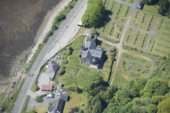 Oblique aerial view of Kilmun Cemetery, St Munn's Church, and Collegiate Church of St Mun, looking W.