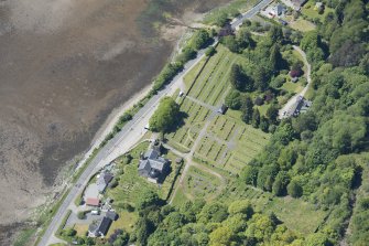 Oblique aerial view of Kilmun Cemetery, St Munn's Church, Collegiate Church of St Mun and St Munn's Church and Churchyard, looking WSW.