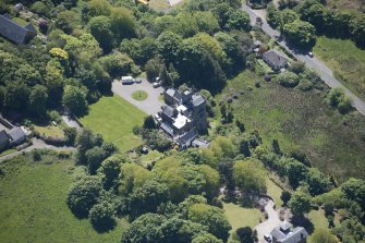 Oblique aerial view of Craigrownie Castle, looking SSW.