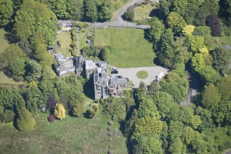 Oblique aerial view of Craigrownie Castle, looking ENE.