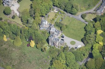 Oblique aerial view of Craigrownie Castle, looking NE.