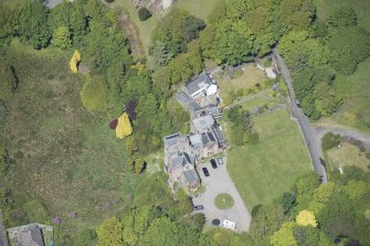 Oblique aerial view of Craigrownie Castle, looking N.