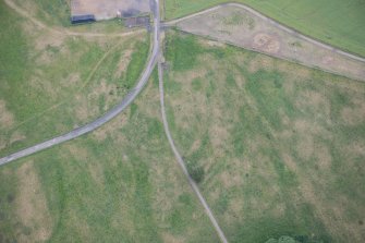 Oblique aerial view of the parkmarks of the plantation bank, looking ENE.