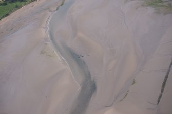 Oblique aerial view of the possible fish trap in Belhaven Bay, looking SSE.