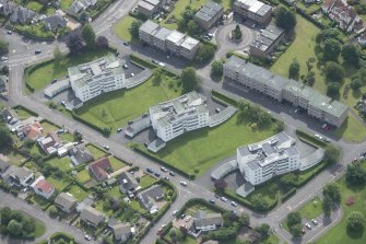 Oblique aerial view of 1-48 Ravelston Garden, looking ESE.