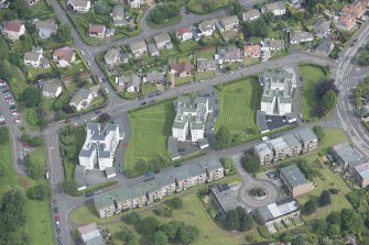 Oblique aerial view of 1-48 Ravelston Garden, looking NNW.