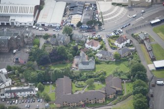 Oblique aerial view of Roseburn House, looking SSE.