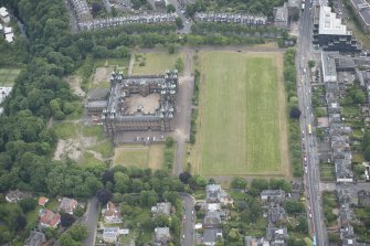 Oblique aerial view of Donaldson's School for the Deaf, the West Lodge and East Lodge, looking E.