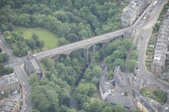 Oblique aerial view of Miller Row Granary, Dean Bridge and Holy Trinity Episcopal Church, looking E.