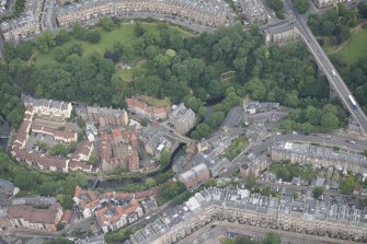 Oblique aerial view of Dean Village, Damside, Dean Path, Rothesay Terrace, Drumsheugh Baths and Belgrave Crescent, looking N.