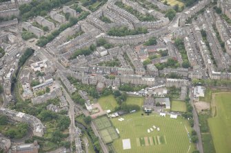 Oblique aerial view of Comely Bank Road, looking S.