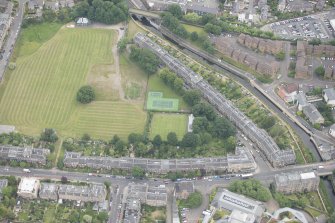 Oblique aerial view of Warriston Crescent, Inverleith Row, and 5 and 6 Inverleith Row, looking ENE.