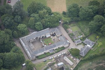 Oblique aerial view of Newhailes House stables, looking SSE.