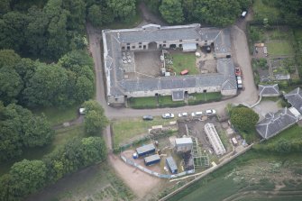 Oblique aerial view of Newhailes House stables, looking SE.