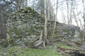 North west wall, view from south showing remains of stairs