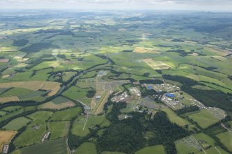 General oblique aerial view of the setting up of T in the Park at Strathallan, looking ENE.